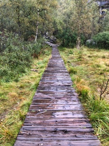 Wet wooden walking path in Preikestolen